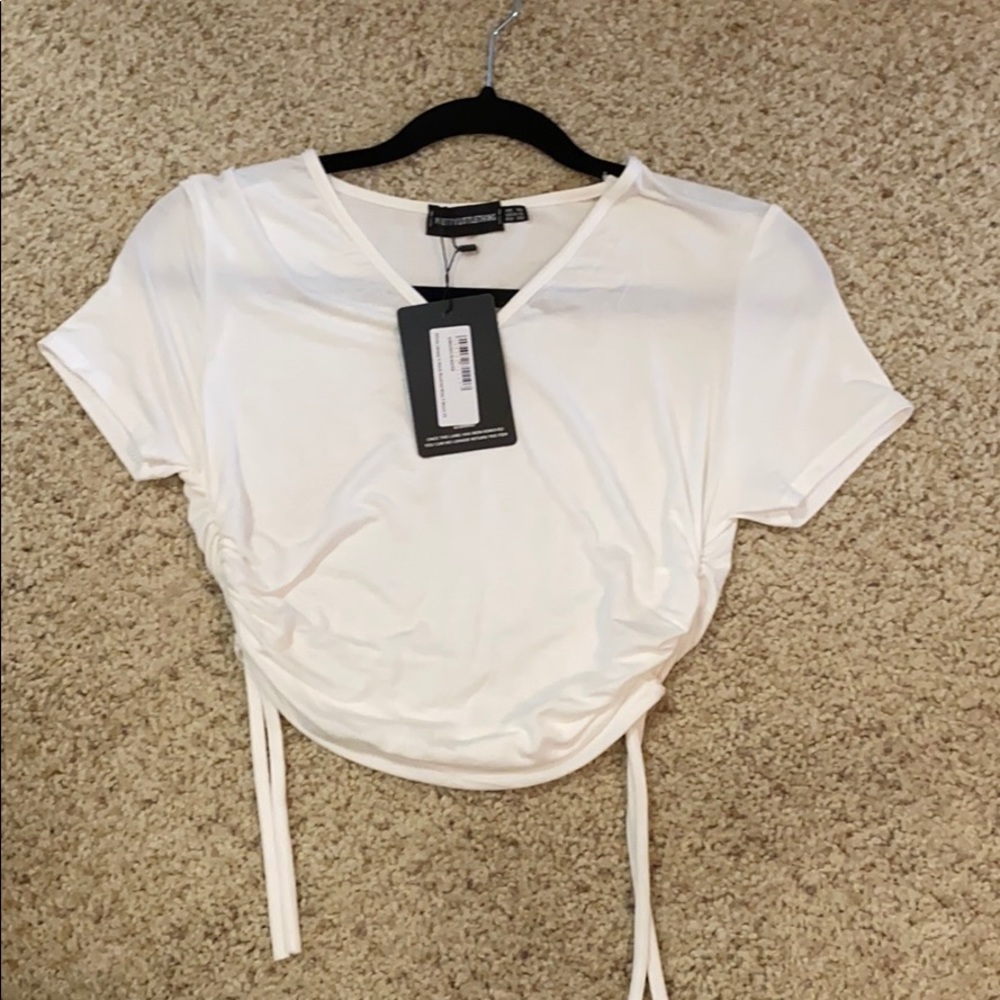 White scrunched side crop top